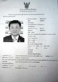 Police circulate arrest warrants for Thaksin and Pojaman